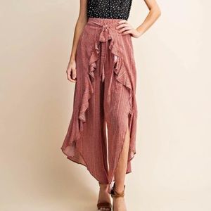 Rust ruffled dress pants